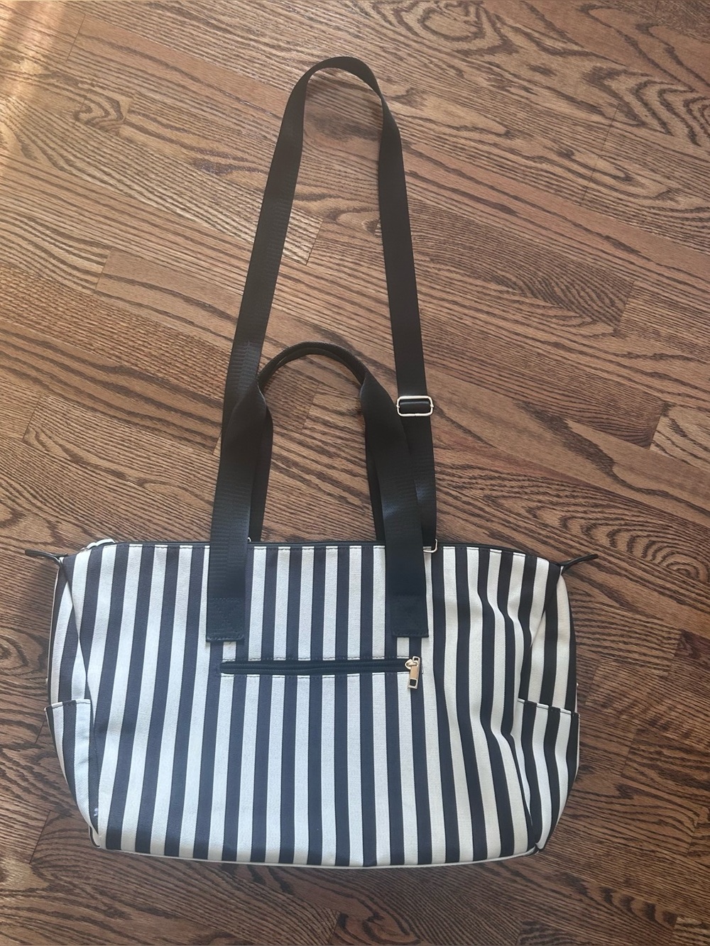Alice + Olivia black and white striped duffel bag